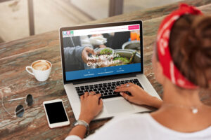 Woman viewing the Palmetto Cap website on tablet